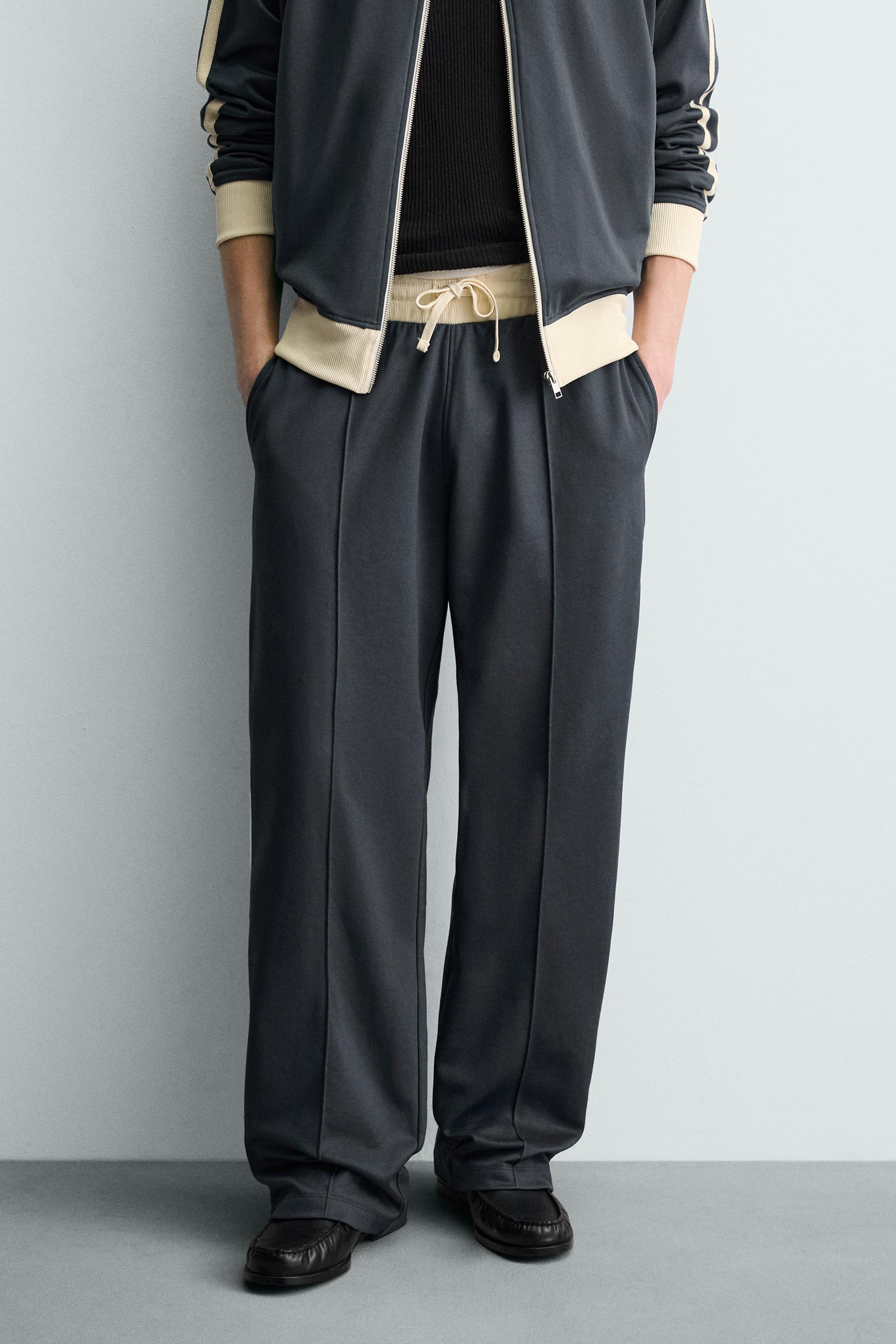 WIDE FIT JOGGER PANTS WITH STRIPES