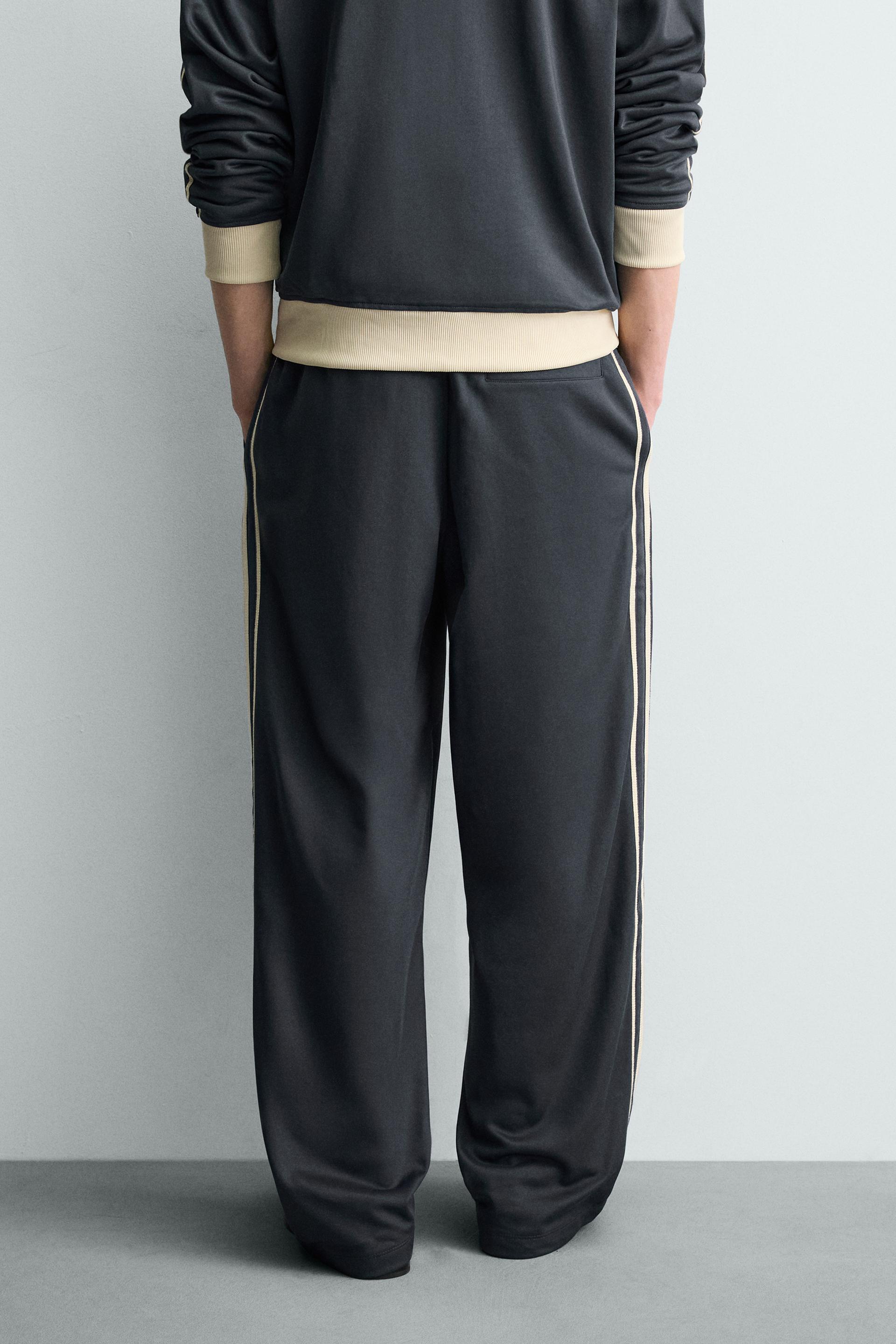 WIDE FIT JOGGER PANTS WITH STRIPES