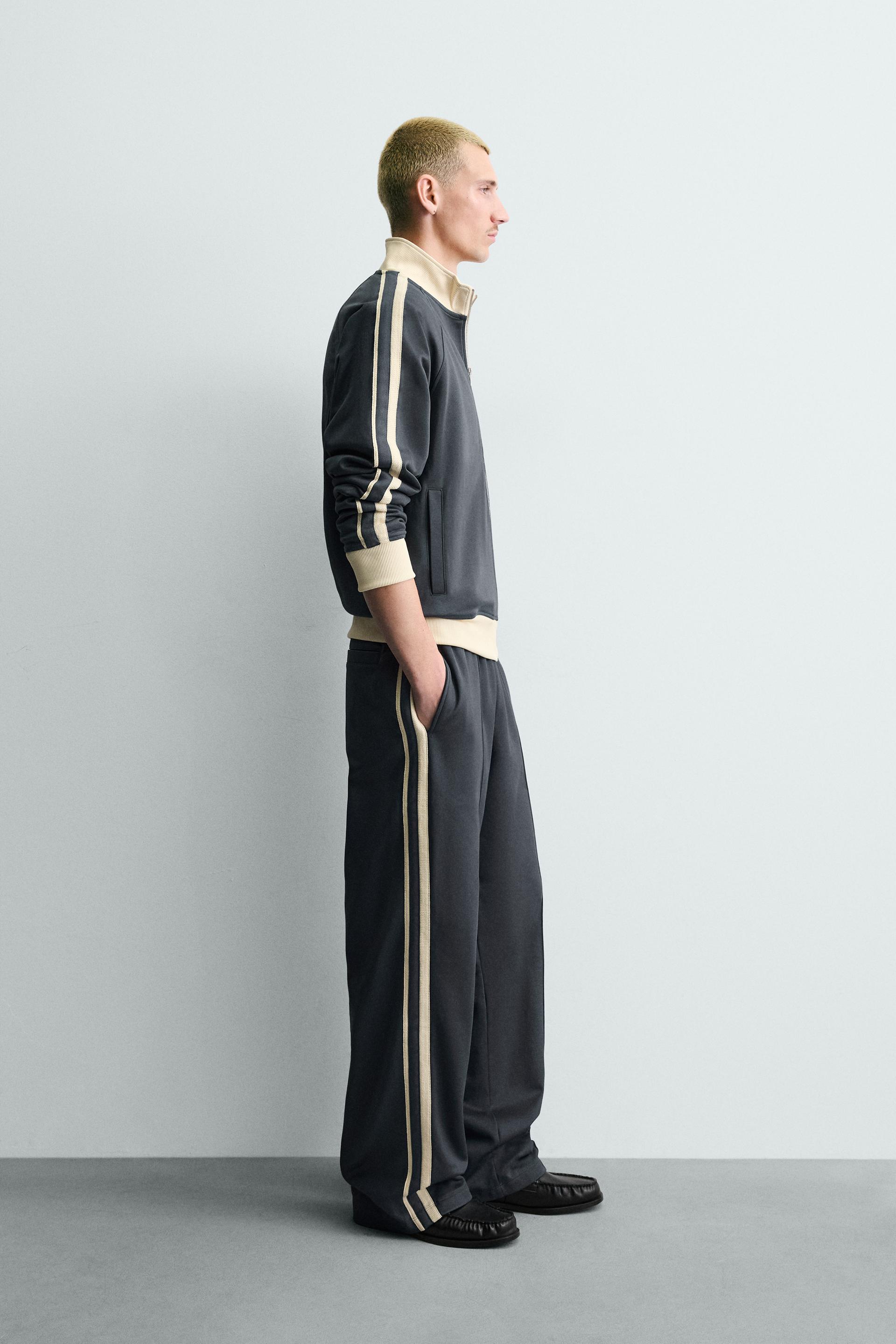 WIDE FIT JOGGER PANTS WITH STRIPES
