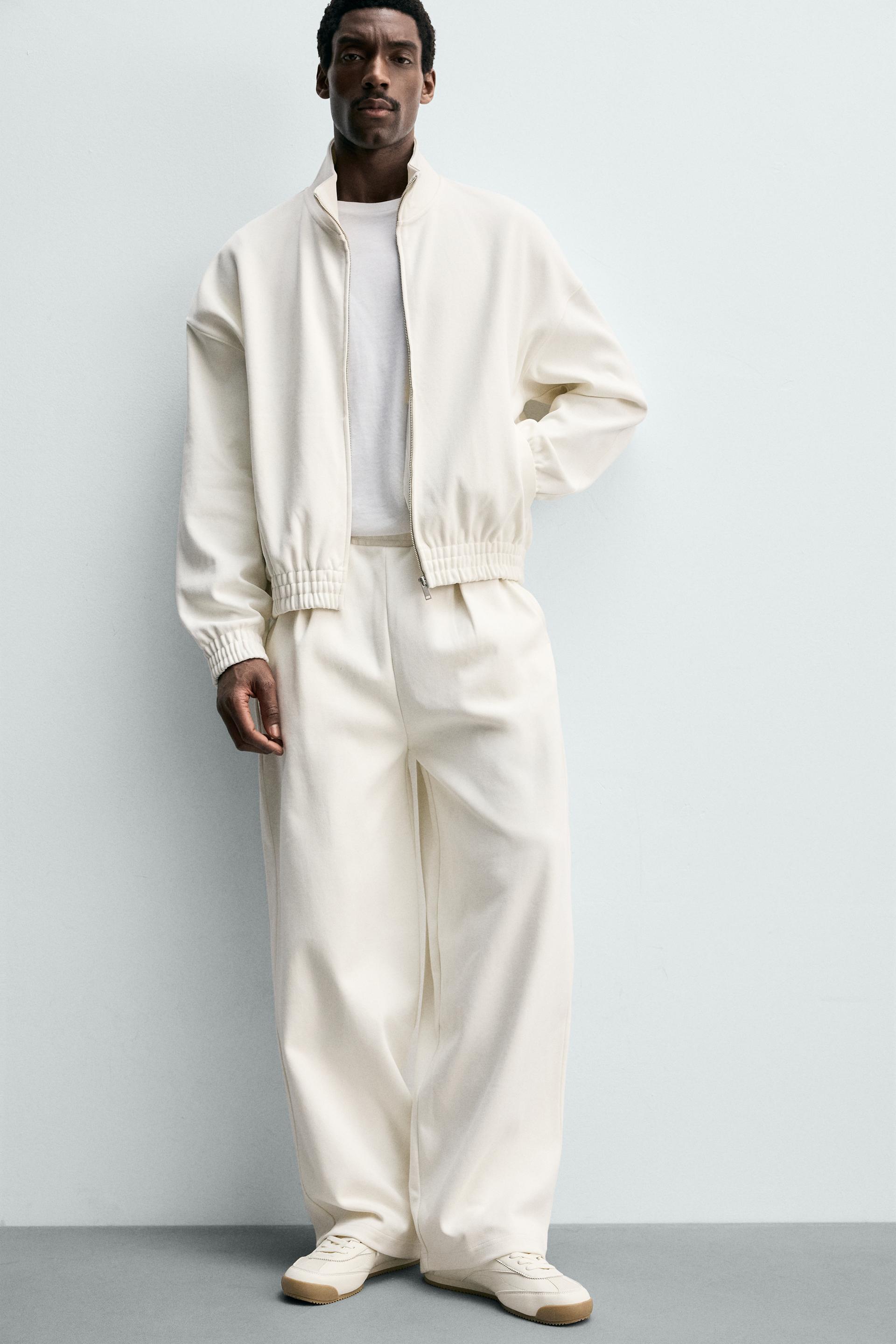 PLEATED WIDE FIT JOGGER PANTS